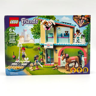 LEGO Friends Heartlake City Vet Clinic building set with minifigures, animals, and clinic building featuring examination room