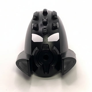 Black Bionicle Mask Ruru with white eye openings, protruding details on crown, and side-mounted ear pieces.