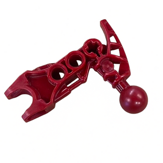 Dark red Bionicle arm piece with ball joint connectors and articulated segments on white background.