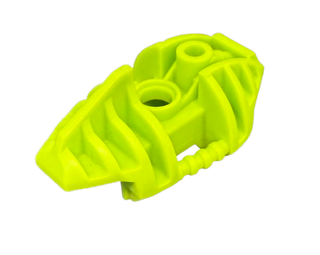 Bright yellow-green Bionicle Piraka upper leg armor piece with ribbed surface details and attachment ports.