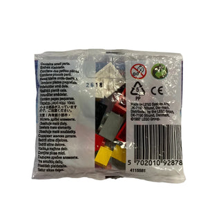 LEGO Santa Claus minifigure in clear polybag with red suit, white beard, and black boots.