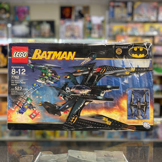 LEGO Batman set 7782 box showing black aircraft with yellow accents, minifigures, and explosion graphics.