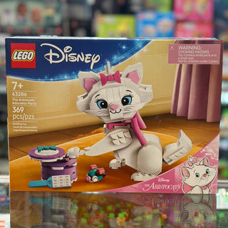 LEGO Disney set featuring a white cat character with pink bow and accessories on product box.