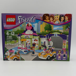 LEGO Friends set 41320 box showing frozen yogurt shop building with minifigures, yellow cars, and accessories.
