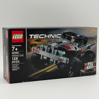 LEGO Technic Getaway Truck set 42090 box showing black and gray truck with red flames and pull-back motor feature.