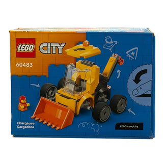 Yellow LEGO construction loader with orange bucket, black wheels, and minifigure on blue and orange product packaging.
