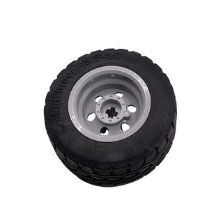 Wheel 30.4mm D. x 20mm with No Pin Holes and Reinforced Rim with Black Tire 49.5 x 20 (56145 + 15413), Part# 56145c05 Part LEGO® Light Bluish Gray Very Good