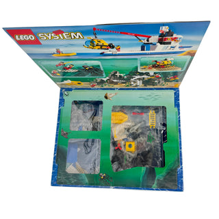 LEGO System diving set box open showing yellow submarine, ship, helicopter, and underwater components in labeled compartments
