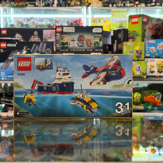 LEGO Creator Ocean Explorer 31045 set box showing ship, aircraft, and submarine models with "3 in 1" configuration.