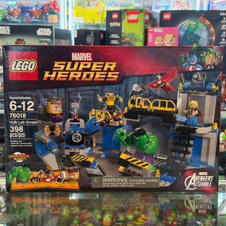 LEGO Marvel Super Heroes Hulk Lab Smash set 76018 with minifigures, lab equipment, and green Hulk figure.