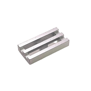 Light gray rectangular tile with two parallel grille slots and bottom groove detail, shown at angle.