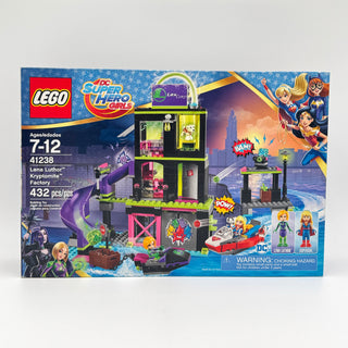 LEGO Super Hero Girls set 41238 featuring black and neon green multi-story factory building with minifigures and accessories.