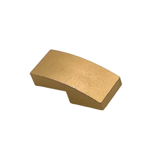 Tan curved slope brick piece with smooth top surface and rectangular base.