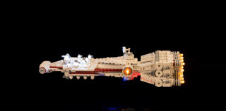 LEGO Tantive IV starship with illuminated engines and interior lights against black background.
