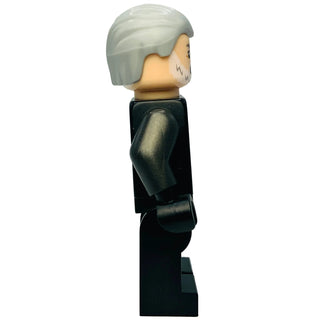 Minifigure with gray swept hair, tan face, and black outfit with armor details.