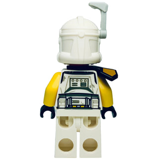 Clone Trooper minifigure with white helmet, yellow and black armor, rangefinder accessory, and printed chest details.
