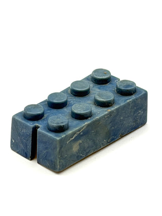 Dark blue rectangular brick with two rows of round studs on top and slots on opposite sides.