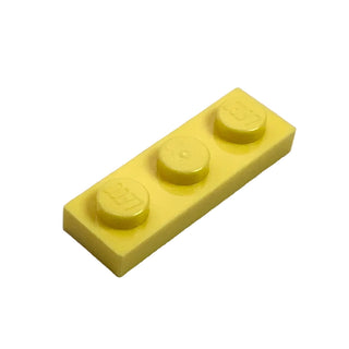 Yellow plastic building plate with three round studs on top surface.