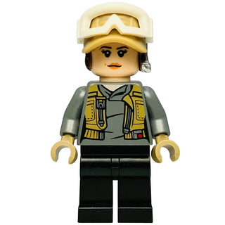 LEGO minifigure with tan and gold helmet, gray and yellow torso with chest details, black legs, and tan hands.