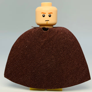 LEGO minifigure with tan head, brown robe, and brown fabric cape with goatee detail on face.