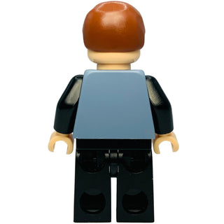 LEGO minifigure with reddish-brown hair, tan face, sand blue vest, black arms, and black legs.