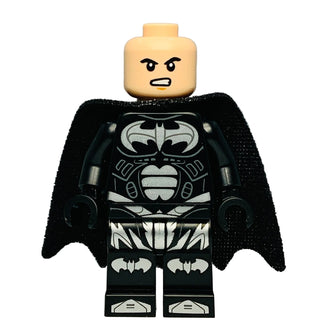 LEGO Batman minifigure with tan head, angry expression, black suit with silver bat symbol and trim, black fabric cape.