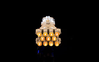 LEGO Tantive IV spaceship model with illuminated orange and white LED lights installed throughout the structure.