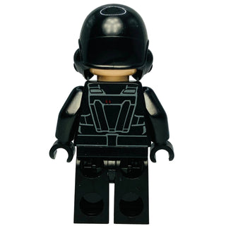 Minifigure with black helmet, tan neck, black torso with printed armor detail, and black legs with printed utility pockets.