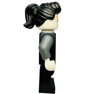 LEGO Ninjago Faith minifigure with black striped hair, tan face, gray arm, and black torso and legs.