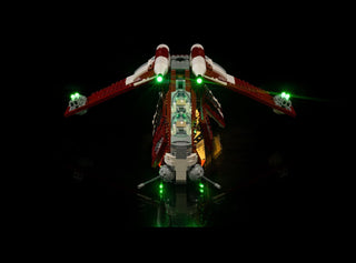 LEGO Coruscant Guard Gunship with green LED lights installed on wings, engines, and body against black background.