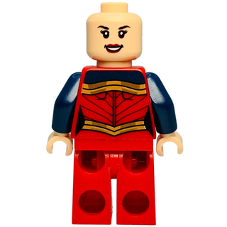 Minifigure with tan head, red costume with gold trim, dark blue shoulders, and red legs.