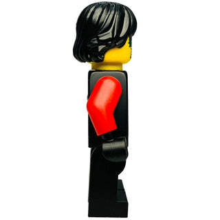 LEGO minifigure with black hair, yellow face, red hand piece, and black torso and legs.