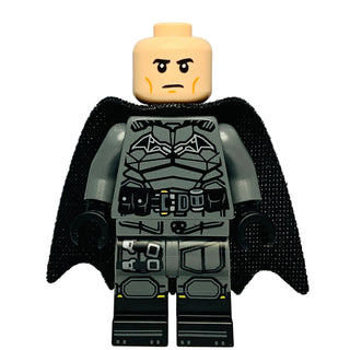 LEGO Batman minifigure with dark bluish gray suit, black cape, cowl with white eyes, and black boots.