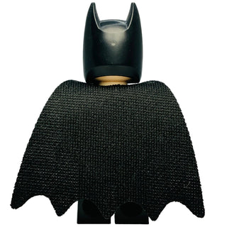 LEGO Batman minifigure wearing black suit with silver bat emblem and black cowl with pointed ears.