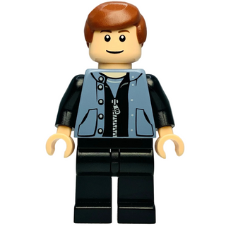 LEGO minifigure with brown hair, sand blue vest over black shirt, black legs, and yellow hands.