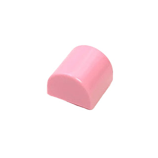 Pink curved slope brick with rounded top and flat front face.
