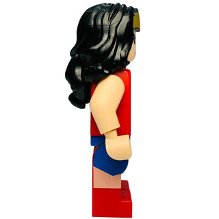 Action figure with black hair, red and blue costume, and tan skin tone shown in side profile.