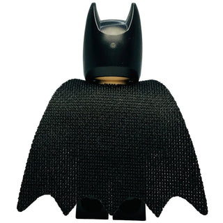 LEGO Batman minifigure with black cowl, white eye details, dark gray suit, and black cape with scalloped edges.
