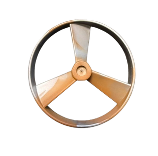 Circular spinner with three tan blades, gray outer ring, and marbled light gray pattern on one blade.