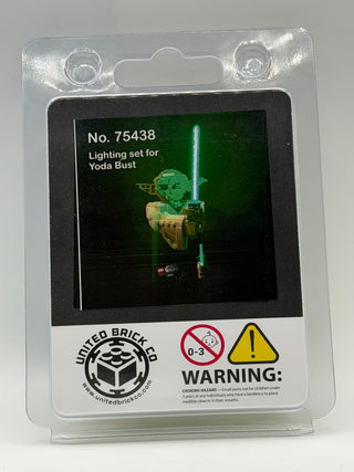 Packaging for lighting set No. 75438 featuring Yoda bust illustration with green lightsaber on black and green label.