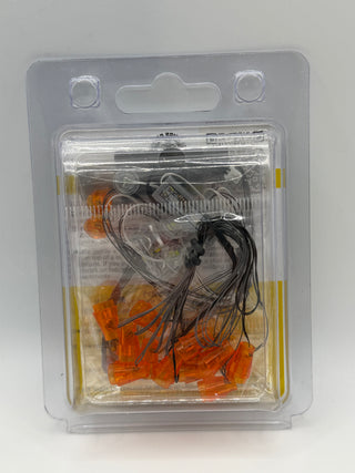 Custom lighting kit containing orange LED lights and black wiring in clear blister packaging with hanging tabs.