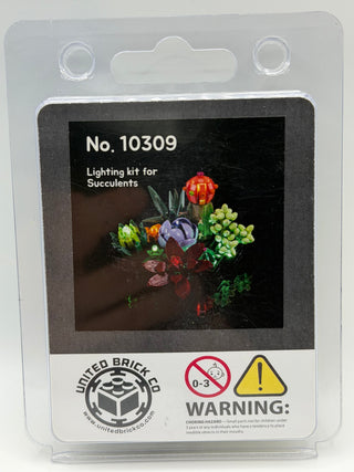 Clear plastic blister package containing lighting kit No. 10309 for succulents with illuminated plant display shown on black 