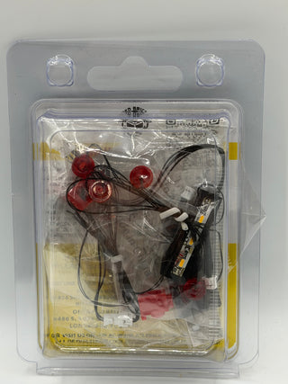Custom lighting kit containing red LED lights, wiring, and control module for LEGO train set 40370.