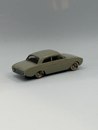 Light gray 1964 Ford Taunus LEGO vehicle model in 1/87 HO scale, shown from side angle.