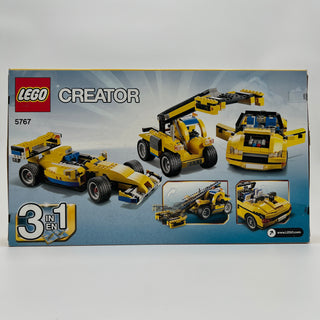 LEGO Creator set 5767 box showing three yellow and blue buildable vehicles: a race car, tow truck, and sedan.