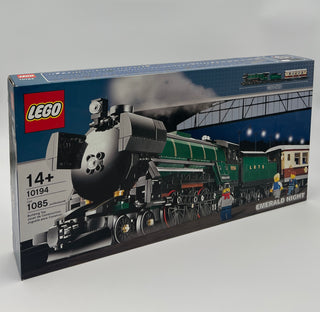 LEGO Emerald Night train set box displaying assembled black steam locomotive with green passenger cars and minifigures.