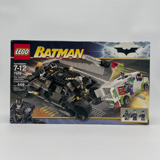 LEGO Batman set 7888 box featuring black Tumbler vehicle, white ice cream truck, minifigures, and Batman logo on gray backgro