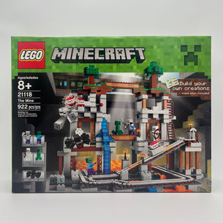 LEGO Minecraft The Mine set 21118 box showing pixelated mine structure with TNT blocks, minifigures, and accessories.