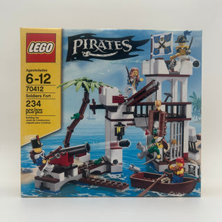 LEGO Pirates Soldiers Fort set 70412 box showing fortified structure with towers, cannon, minifigures, and wooden boat.
