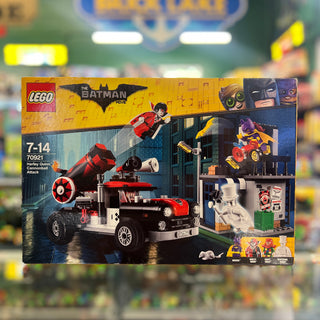 LEGO Batman Movie set 70921 featuring a buildable truck with red cannonball launcher, minifigures, and building elements.